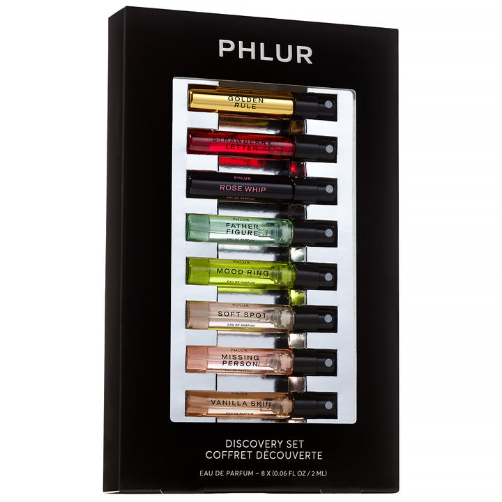 ערכת PHLUR Discovery Set 2026 עם שמונה דוגמיות בושם, כולל Missing Person, Vanilla Skin, Honey Moon, Cherry Stem ו־Afterglow.